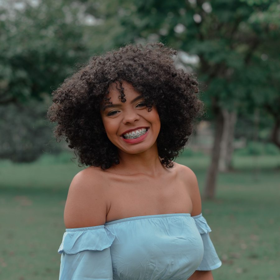 Smiling adult wearing braces